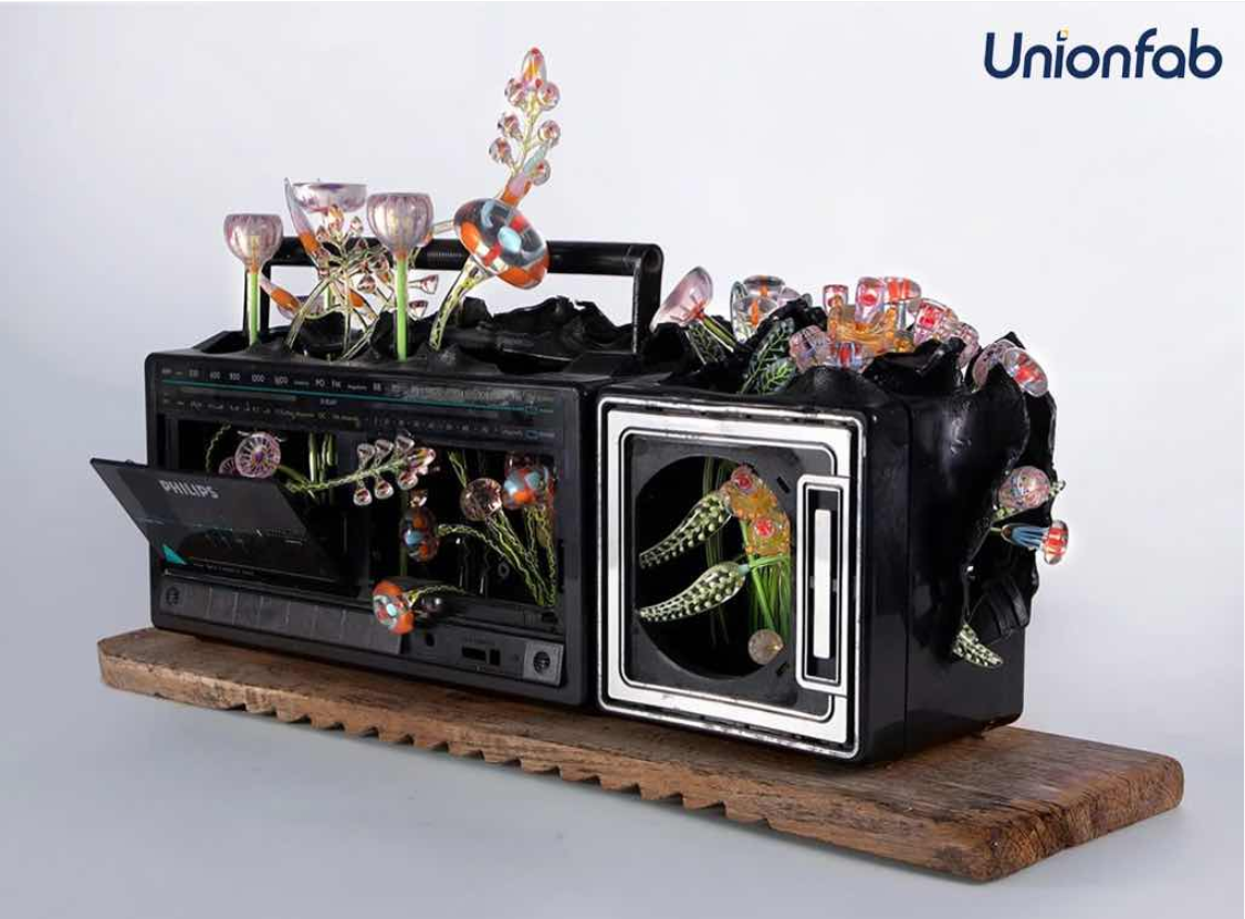 Multi-material PolyJet print simulating floral growth